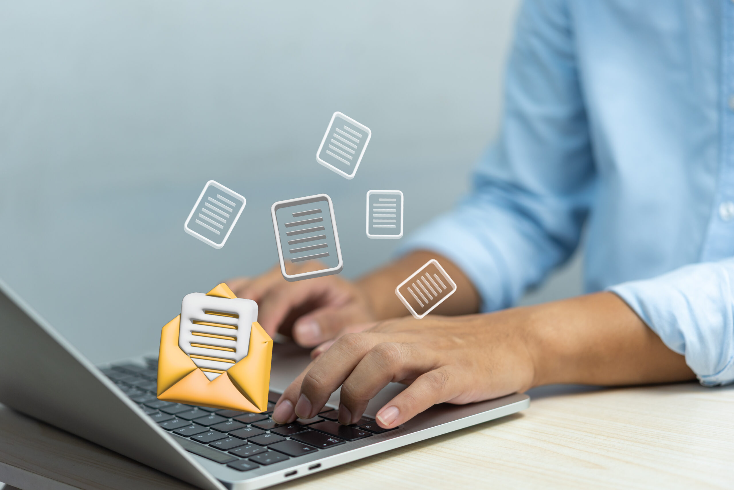 businessman using computer laptop checking email icon online or sending mail to partner and customer on web with virtual interface technology concept.